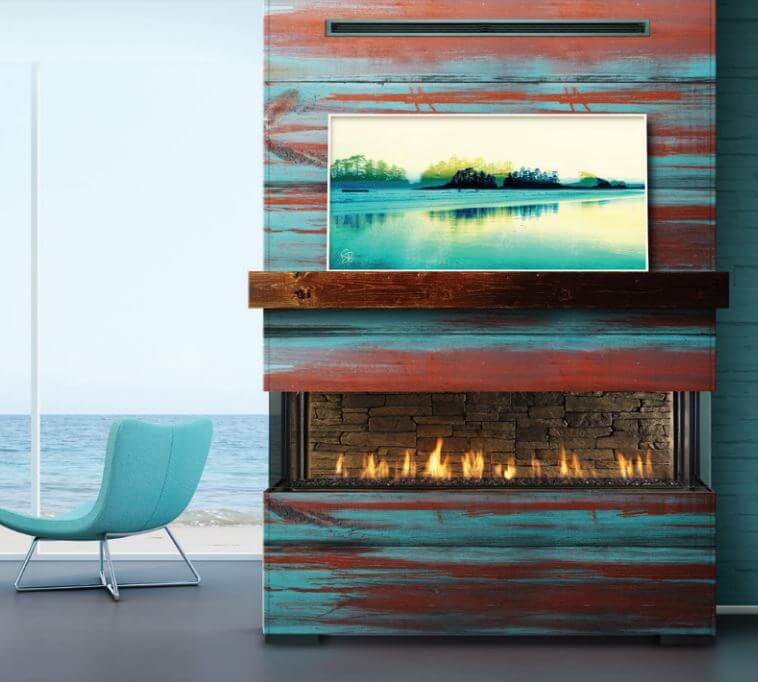 3-sided bay style gas fireplace, Enclave by Marquis with blue and red artsy decoration