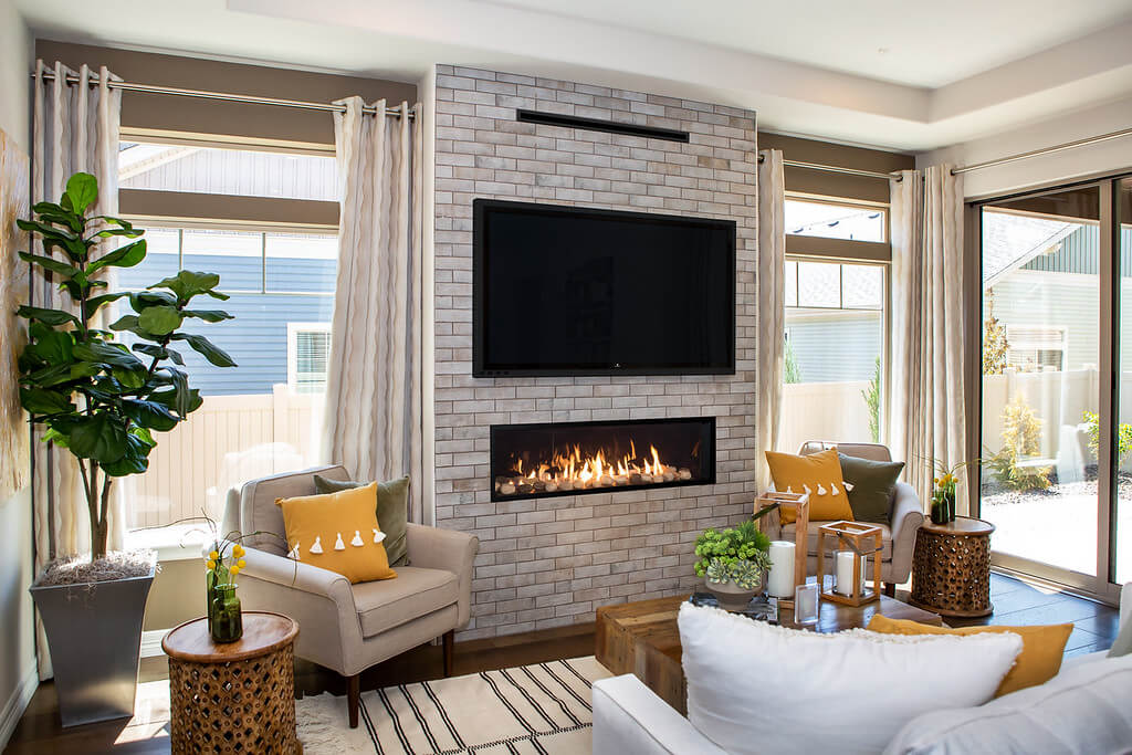 Modern linear fireplace with brick framing