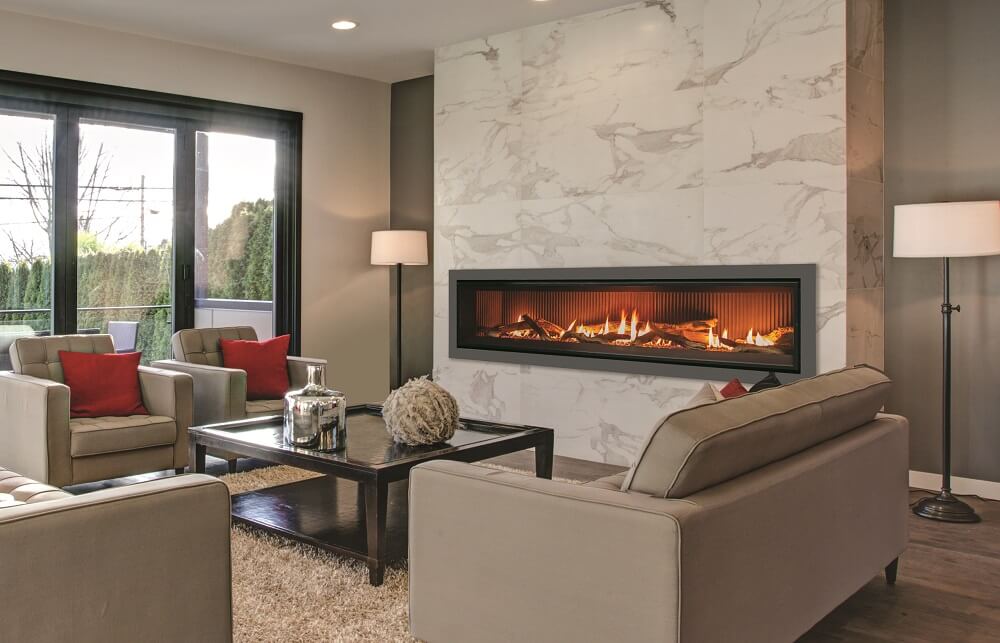 Long linear fireplace against white marble slab